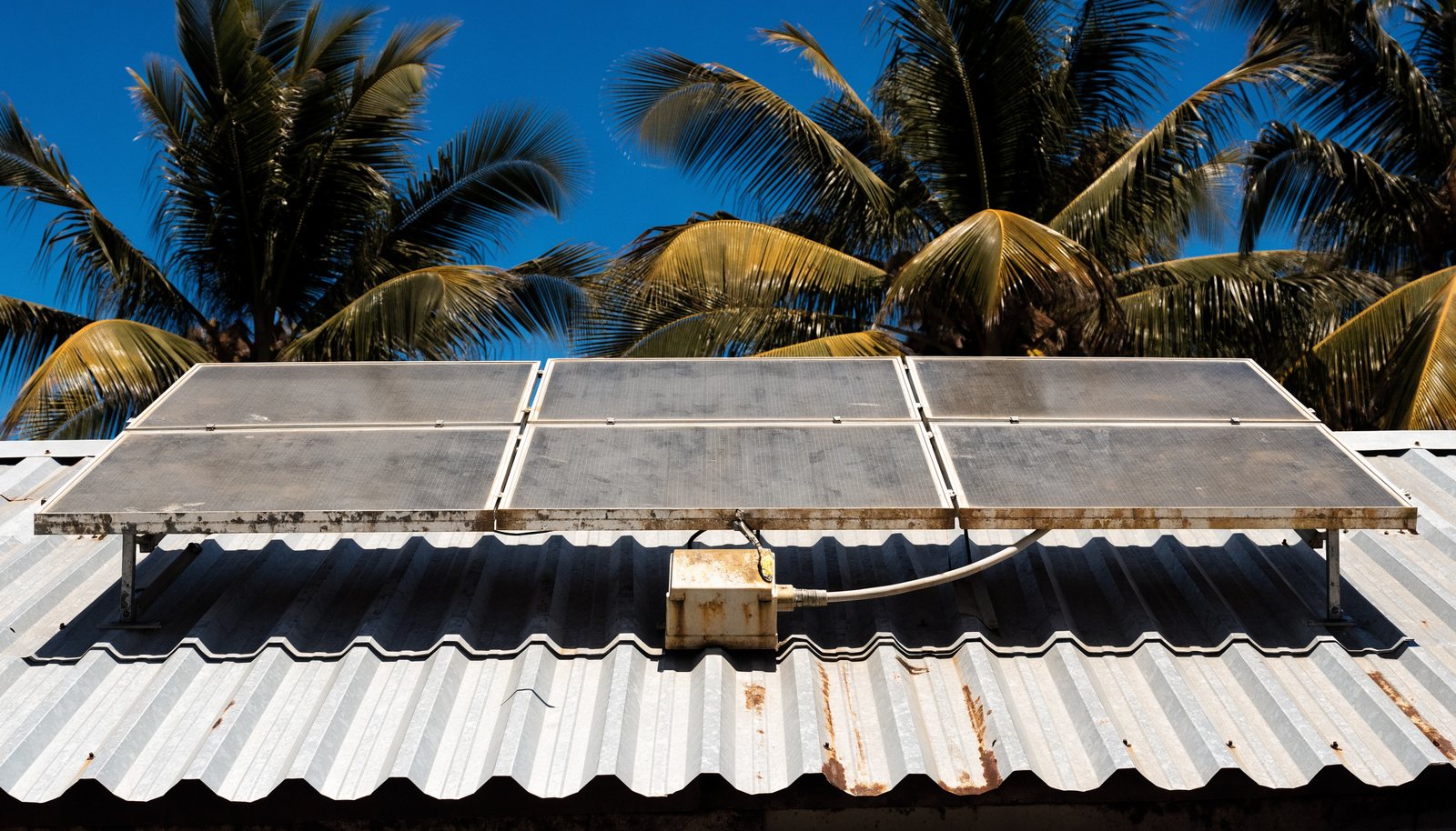 Ageing rooftop solar array on a Mackay home, due for replacement
