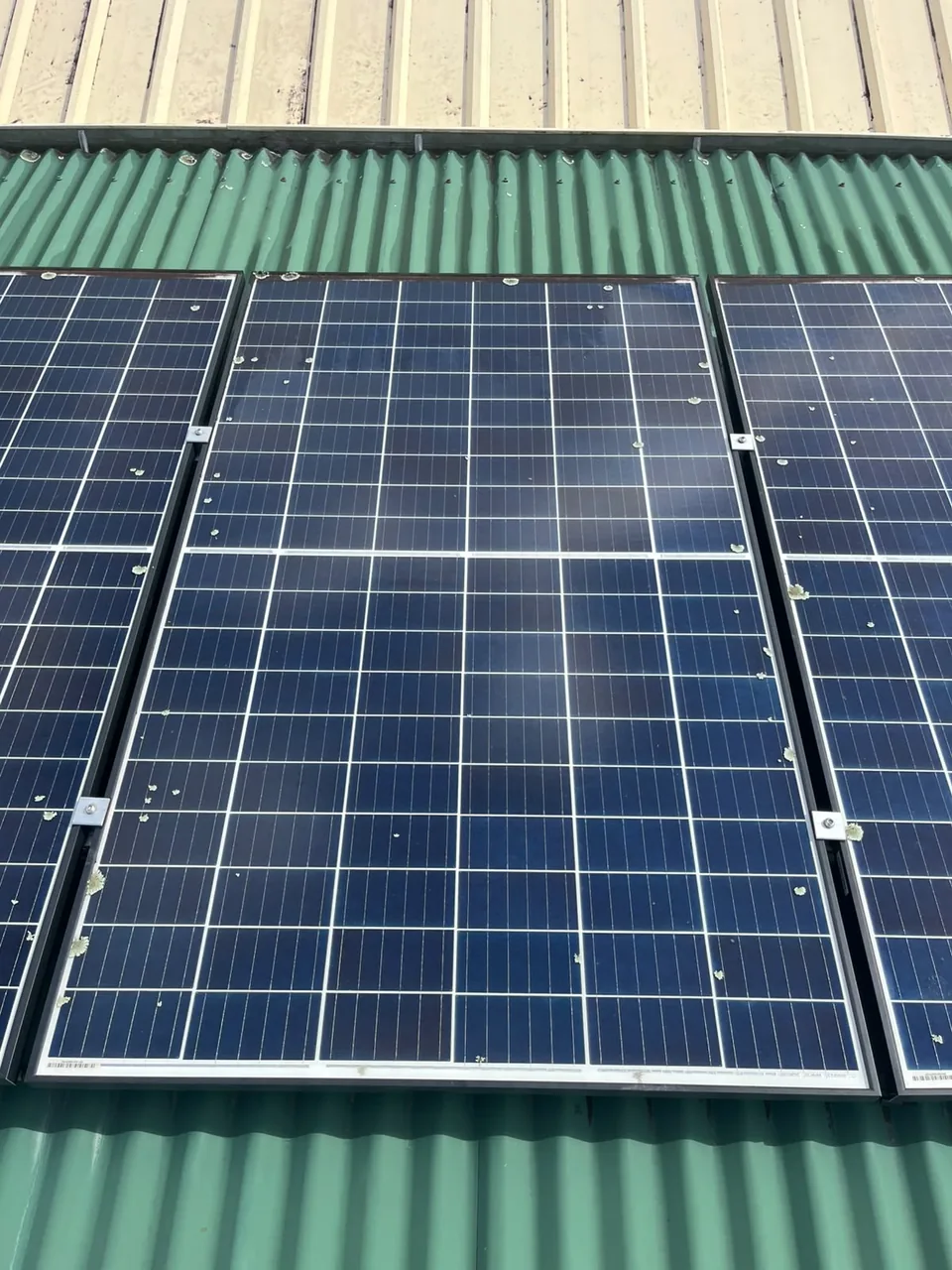 A solar panel with marks on the glass, photographed before the clean