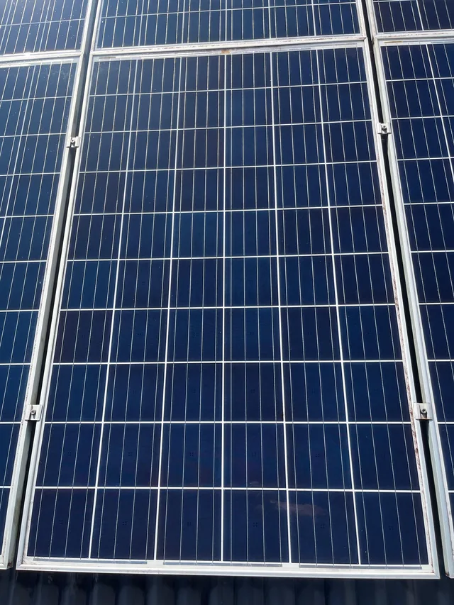 The same solar panel photographed from the same spot after the clean